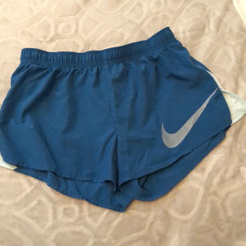 Blue nike running shorts